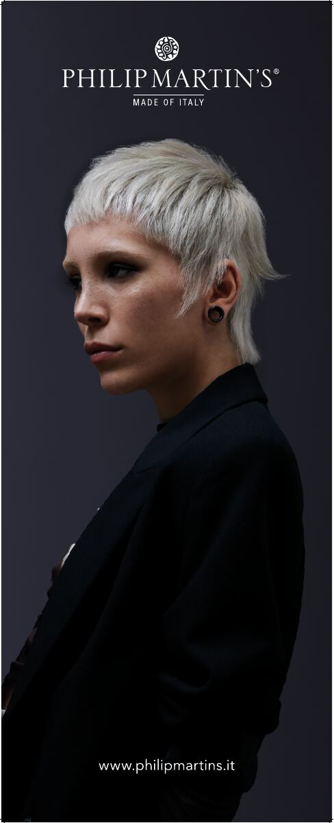 A model with a cropped platinum cut, in a Philip Martin's poster